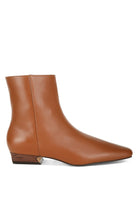 Stylish Obita leather boots for vacation in brown featuring a sleek design and low heel