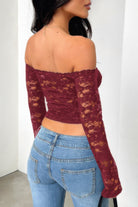 Women's off shoulder lace top in burgundy with long sleeves and a fitted design