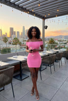Women's off shoulder mini dress in pink, perfect for club outings