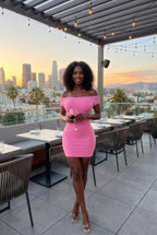 Women's off shoulder mini dress in pink, perfect for club outings