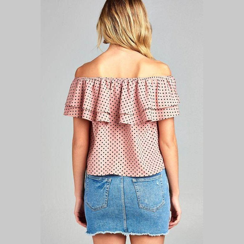 Back view of Women's off shoulder polka dot top by Ivory Felix with ruffle detail