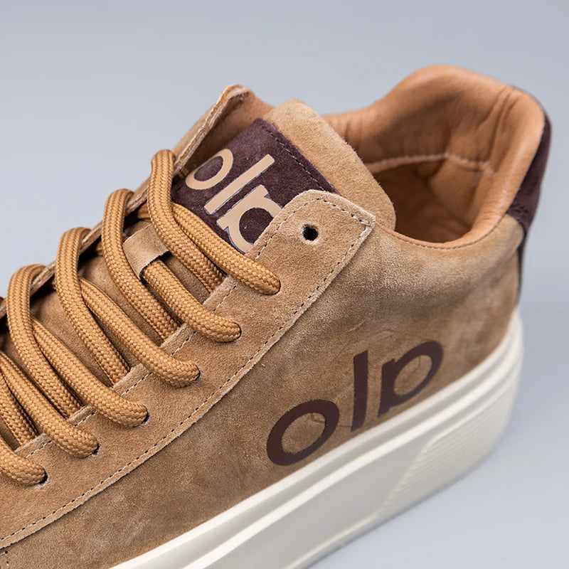 Brown suede sneakers with a platform for casual wear