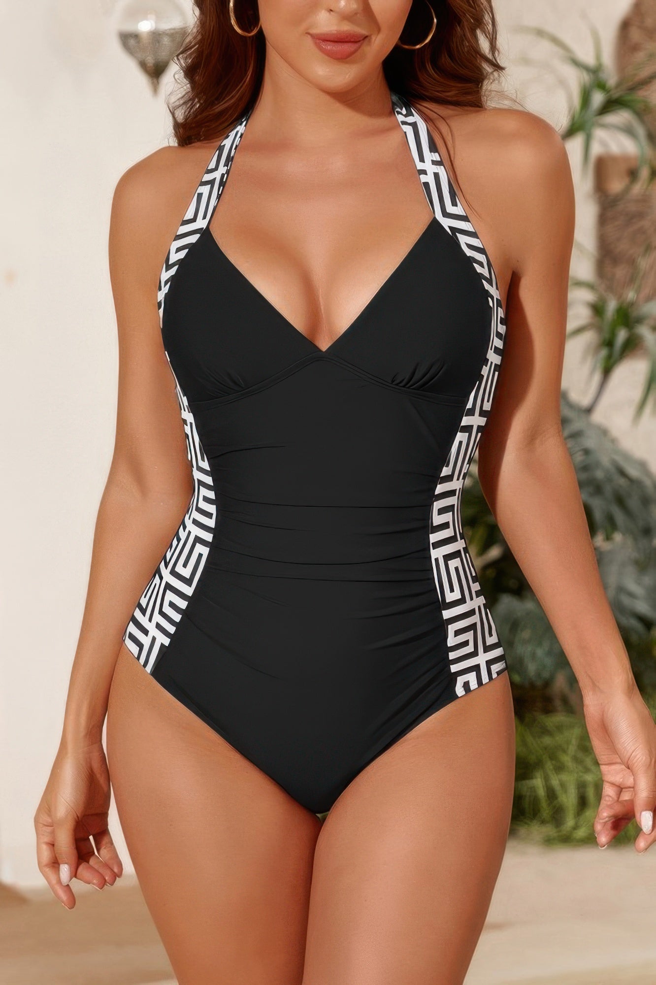 Women's black one piece halter top swimsuit for beach vacations