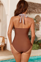 Women's brown one piece halter top swimsuit, ideal for beachwear