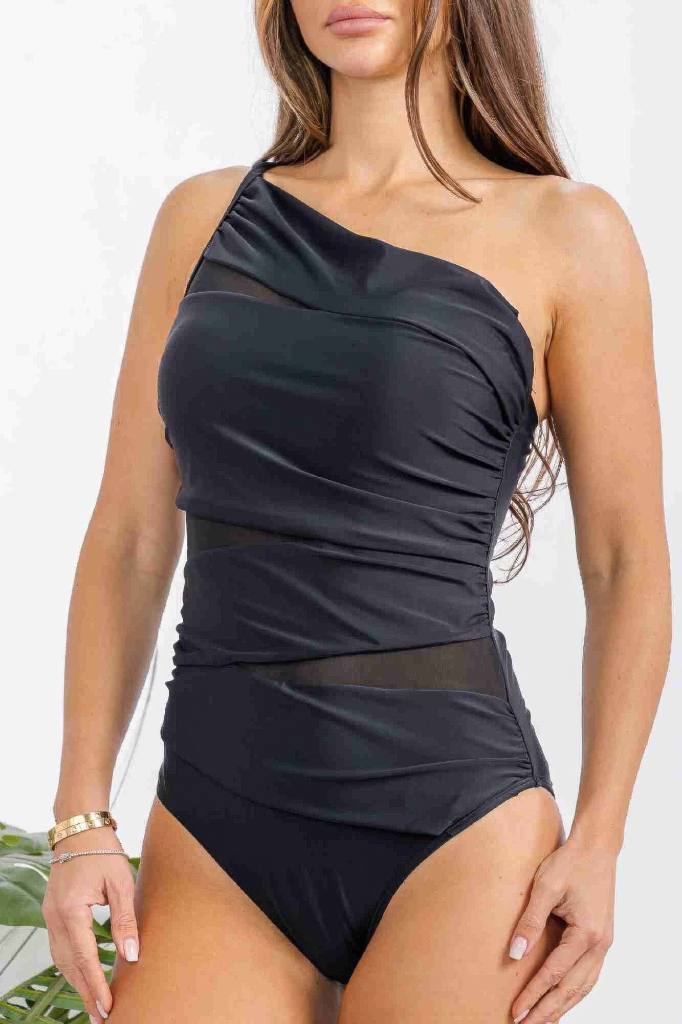 Women's black one-shoulder dress, sleek design for beach outings