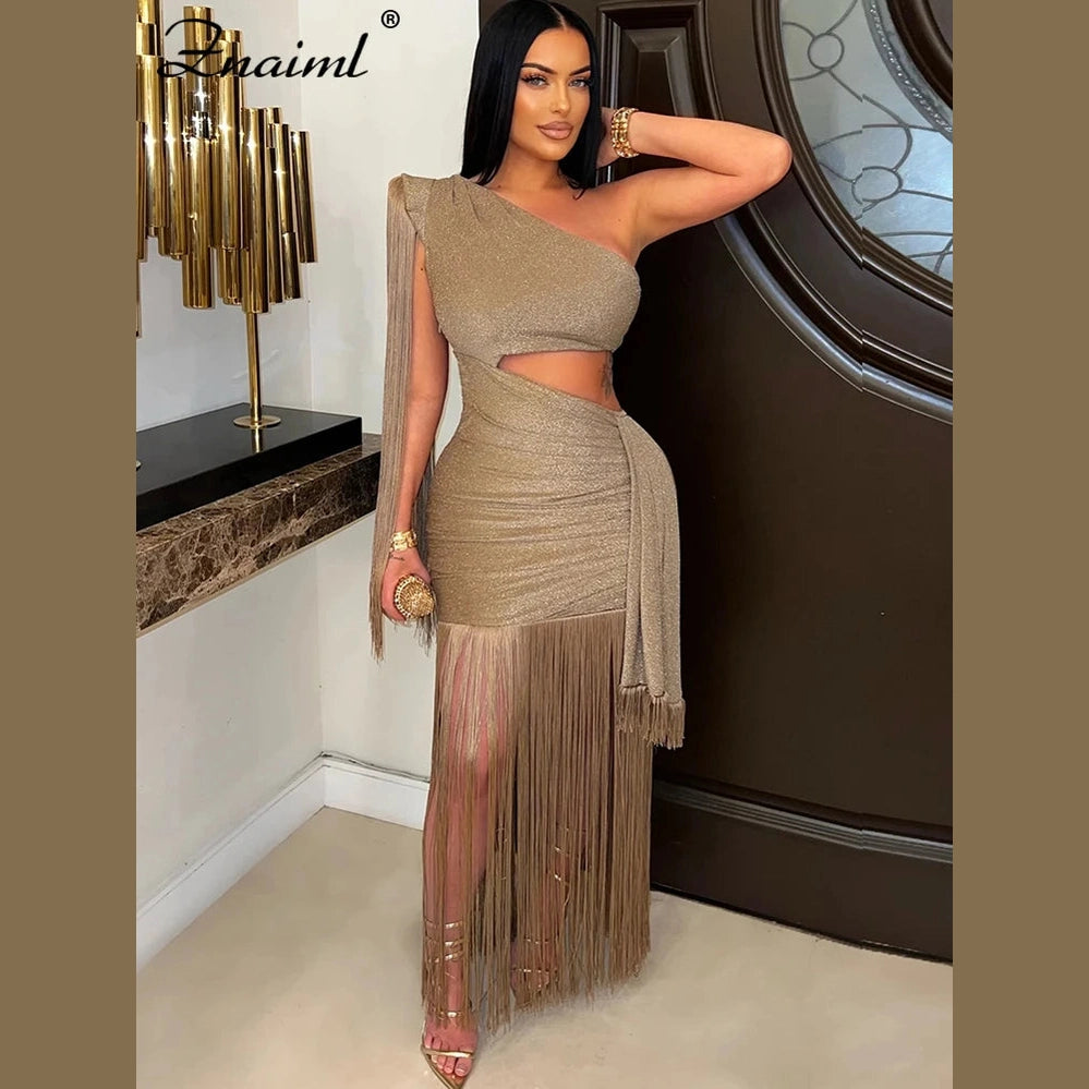 Elegant gold one shoulder fringe dress with cutout and long fringe detailing by VacationGrabs