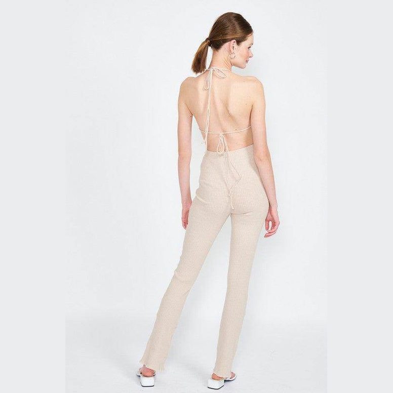 Emory Park open back jumpsuit vacation in beige with a stylish halter neck design for summer outings