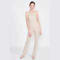 Emory Park open back jumpsuit vacation in beige with a halter neck design, perfect for summer outings.