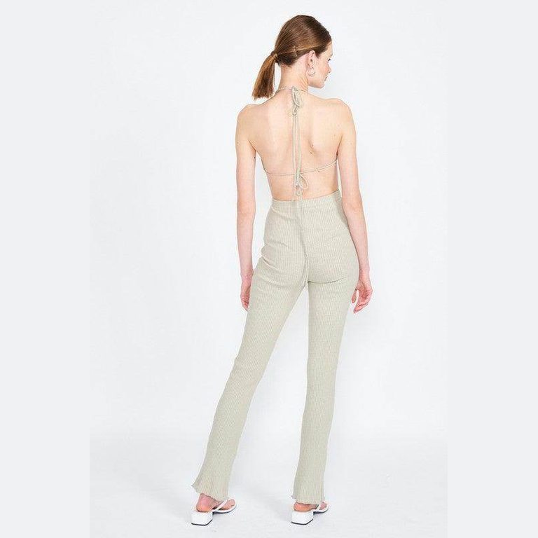 Emory Park open back jumpsuit vacation featuring a trendy halter design and fitted silhouette