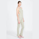 Emory Park open back jumpsuit vacation in light green, perfect for stylish summer outings