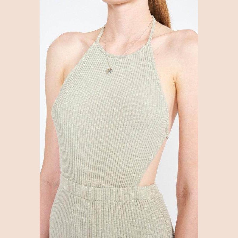 Emory Park open back jumpsuit vacation in soft green ribbed fabric, perfect for stylish summer outings