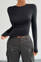 VacationGrabs Open Back Long Sleeve Top in black, featuring a fitted style for versatile fashion