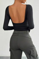 VacationGrabs open back long sleeve top in black showcasing a stylish back design