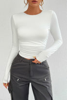 VacationGrabs open back long sleeve top in white, featuring a fitted design and long sleeves