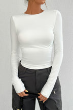 VacationGrabs open back long sleeve top in white featuring a fitted design and long sleeves