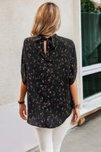 VacationGrabs open back summer tops for women in black with colorful floral pattern and elegant tie detail