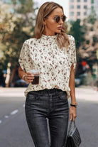 Cream colored floral open back summer tops for women, perfect for casual outings or vacations