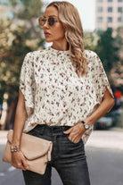Stylish open back summer tops for women with a floral print, perfect for warm weather outings