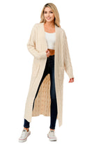 Women's open front cable knit sweater in cream color with long sleeves and pockets
