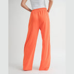 VacationGrabs women's orange drawstring pants with elastic waistband and relaxed fit