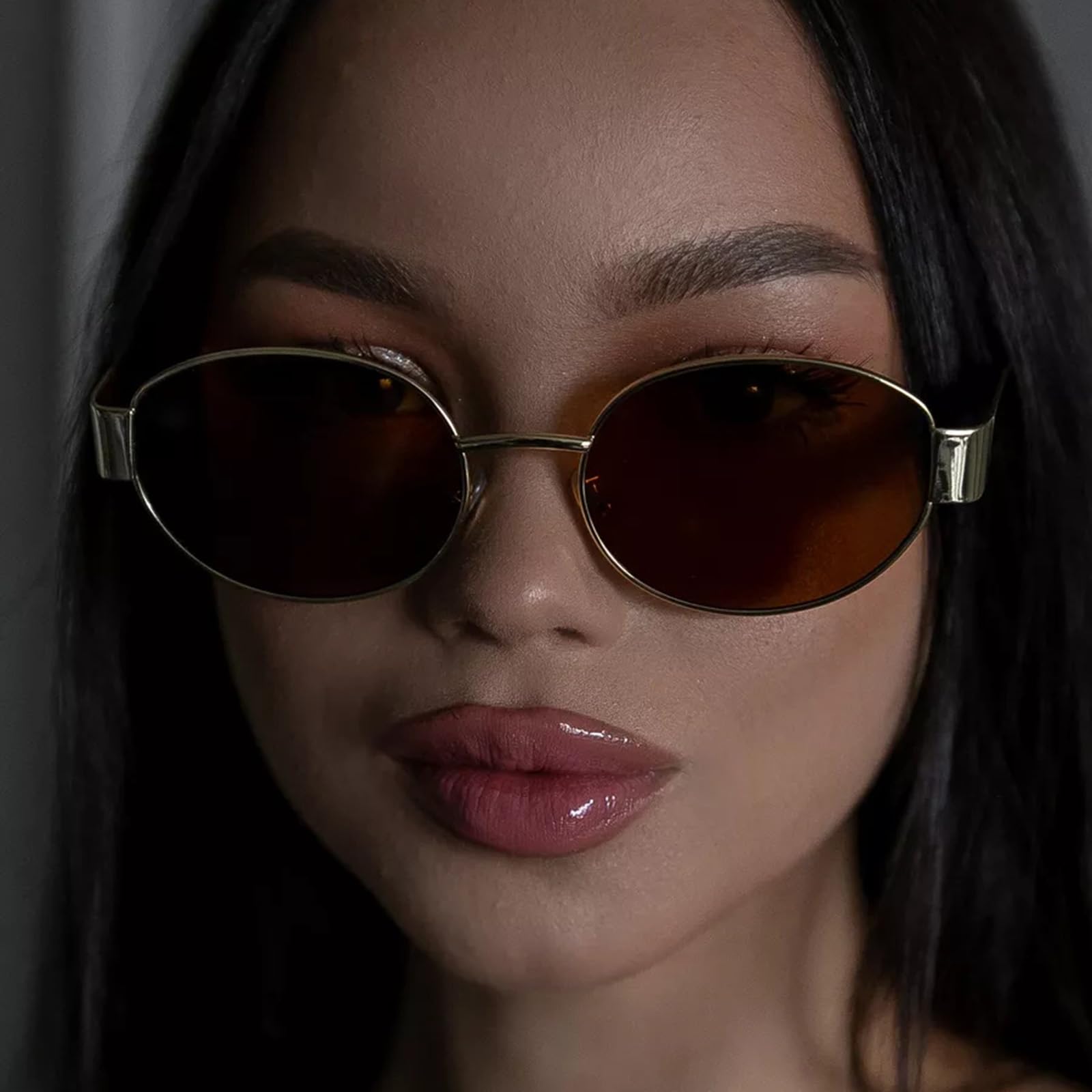Oval sunglasses with brown lenses, stylish accessory for summer outings