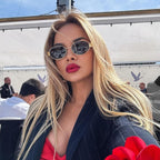 Women's trendy oval sunglasses with metallic frames for stylish outings