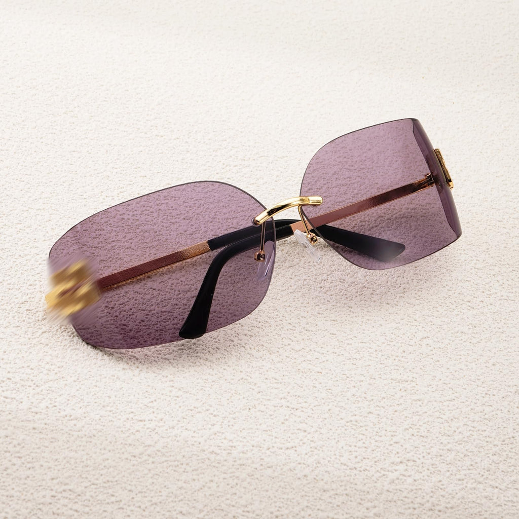 Oversized sunglasses with purple lenses and gold accents, trendy summer accessory