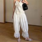 Women's white pajama bottoms plaid with lace trim for comfortable lounging
