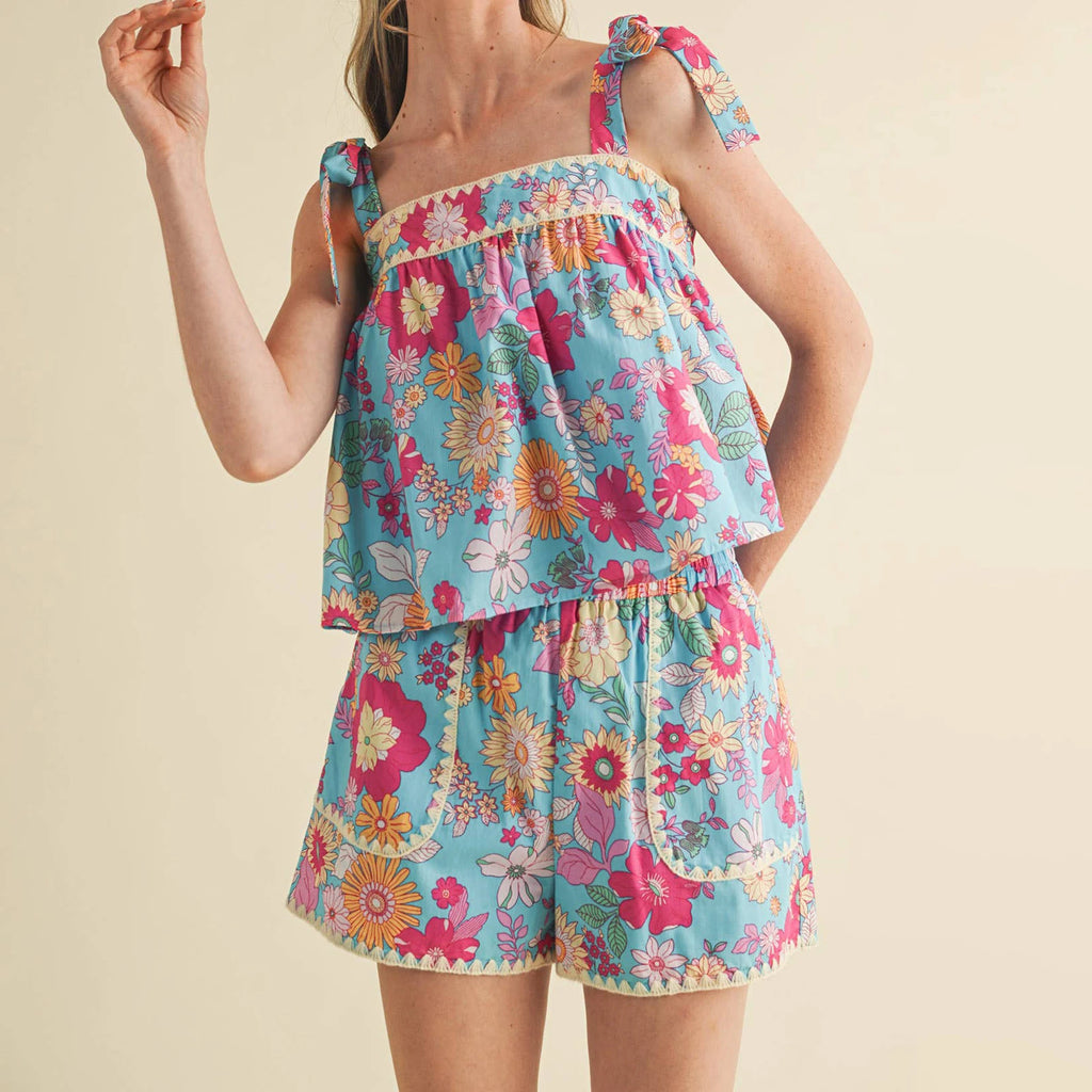 Women's floral pajama set in blue cotton for lounging at home