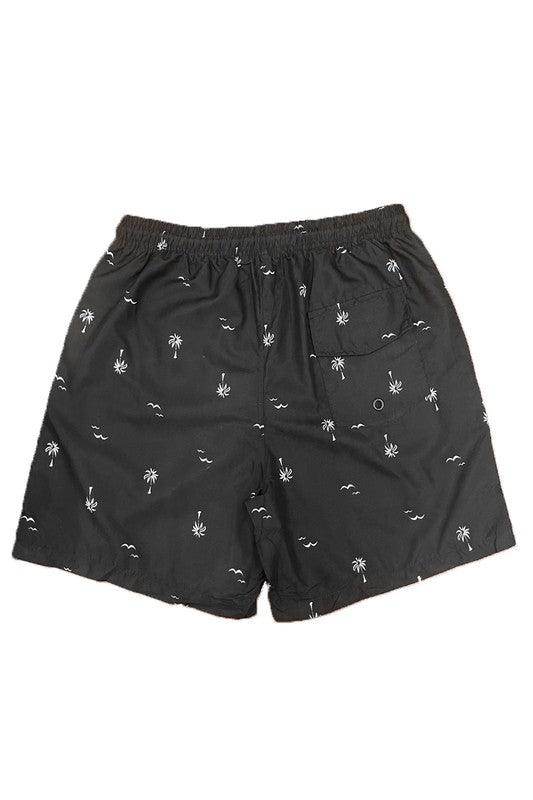 WEIV men's palm print beach shorts featuring a comfortable elastic waistband and fun tropical design