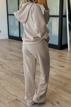 Women's beige pants and bra set, perfect for activewear and casual outings