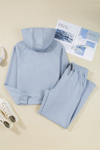 Women's light blue pants and bra set, perfect for active workouts