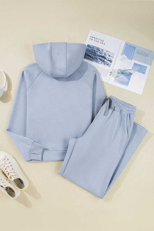 Women's light blue pants and bra set, perfect for active workouts