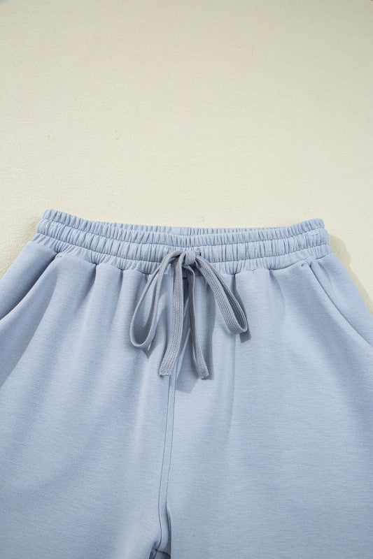 Women's light blue pants and bra set for activewear comfort
