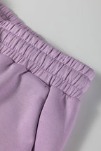 Women's purple pants and bra set, comfortable for active workouts
