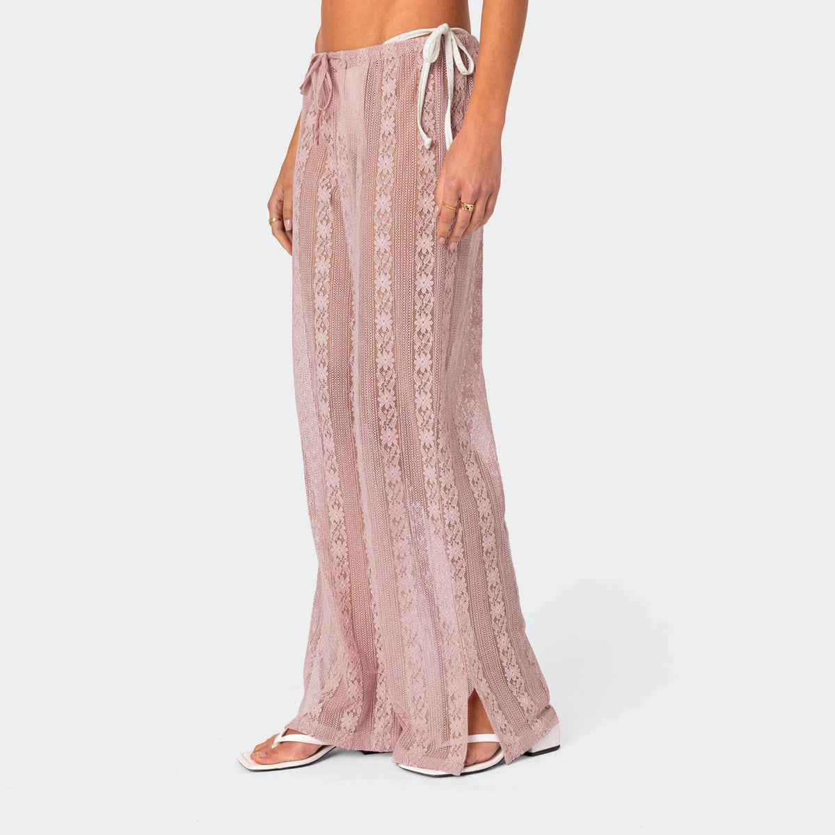 Pink lace pants for the beach, lightweight and stylish for sunny days