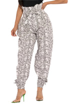 VacationGrabs paper bag waist pants for women in black and white snake print with ankle ties