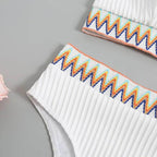 Patchwork Brazilian bikini set in white with colorful trim, perfect for beachwear