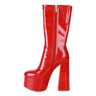Rag Company red patent leather calf boots with a high block heel and zip closure