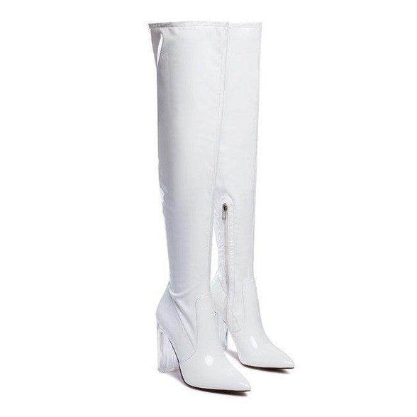 Stylish white patent thigh high boots with pointed toes and clear heels by Rag Company