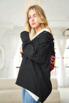Davi & Dani women's black peace symbol vacation shirt with a relaxed fit and vibrant graphic design