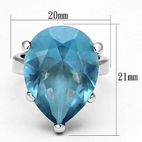 Pear cut statement ring for women featuring a stunning blue gemstone in a silver setting