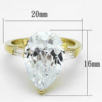 Stunning pear shaped gold engagement ring featuring a large clear stone and elegant detailing