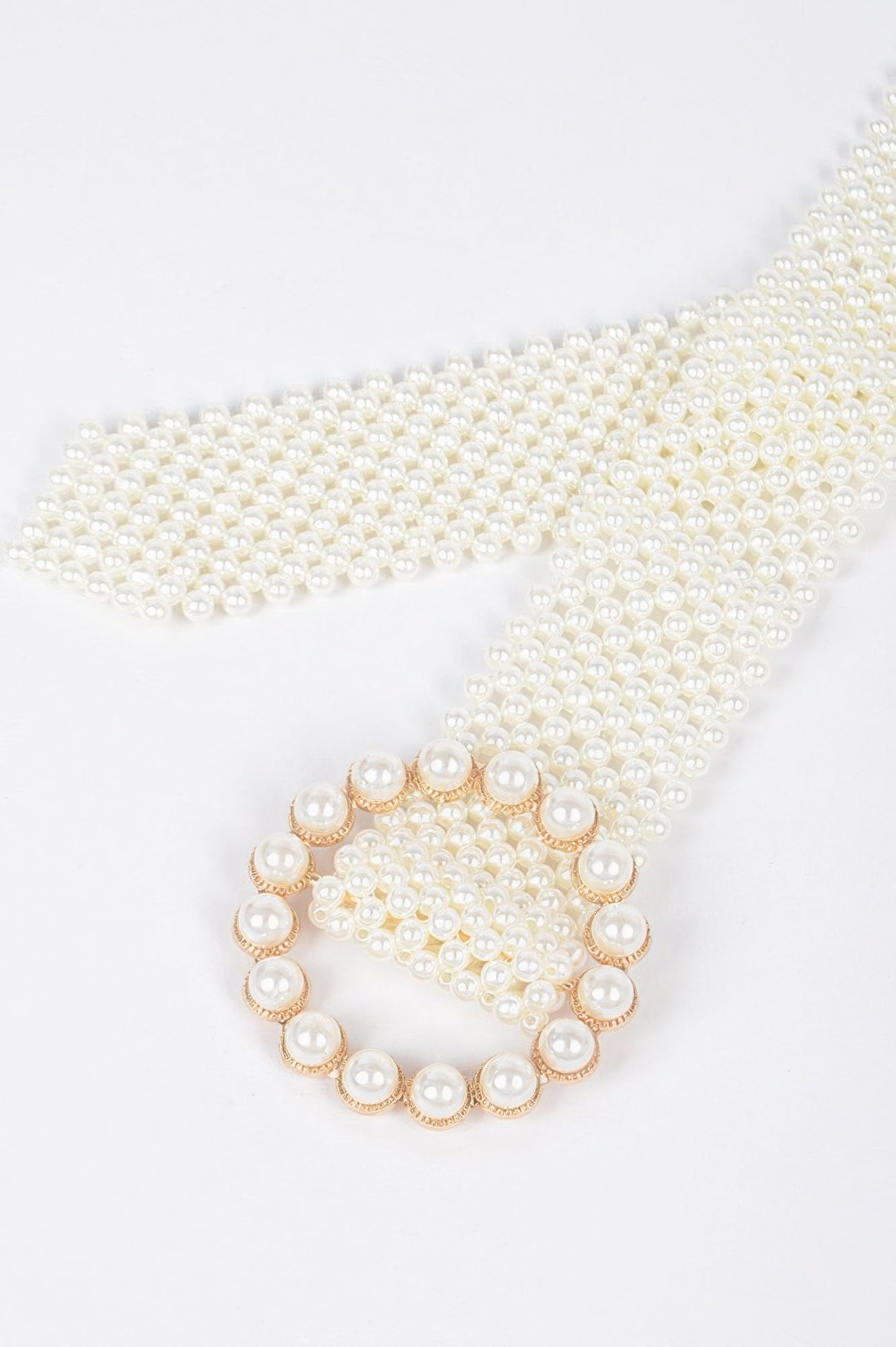 Pearl beaded belt for women featuring a stunning circular pearl buckle and elegant design
