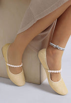 Women's pearl detail Mary Jane flats by Rag Company in glittery beige with pearl straps
