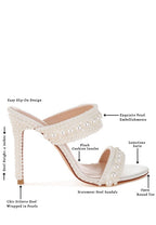 Women's pearl embellished stiletto heels in white satin, perfect for evening events