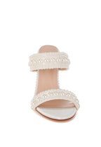Women's pearl embellished stiletto heels for elegant occasions