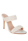 Women's pearl embellished stiletto heels in white for elegant occasions