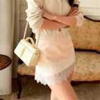 Women's white pencil skirt with lace trim, perfect for casual outings
