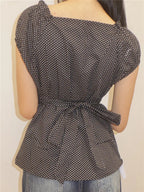 Women's black polka dot peplum top, stylish, perfect for casual outings